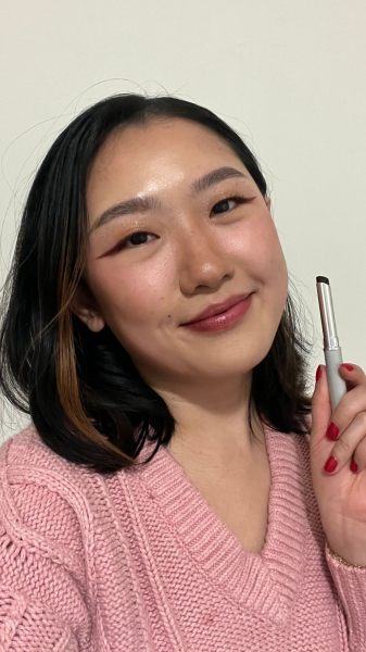 Sarah Han wearing the Clinique Almost Lipstick in Black Honey